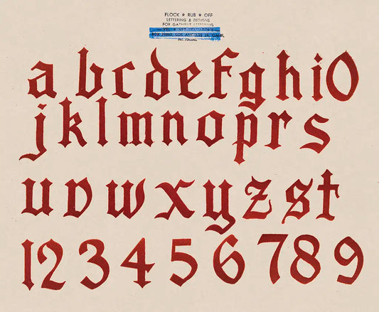 Display of a gothic-style alphabet and numbers on a beige background