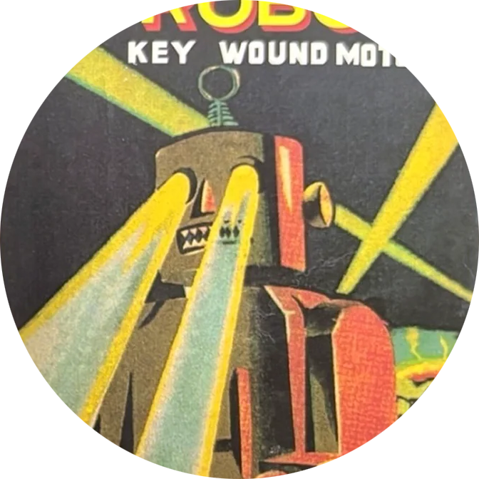 Circular sticker with robot design and text 'Key Wound Motor' on a dark background